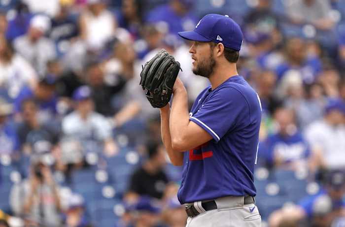 Feb 28, 2020; Phoenix, Arizona, USA; Los Angeles Dodgers starting pitcher Clayton Kershaw (22) throws against the Milwaukee Brewers during a spring training game at American Family Fields of Phoenix. Mandatory Credit: Rick Scuteri-USA TODAY Sports